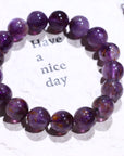 Purple Titanium Auralite 23 Crystal Bracelet